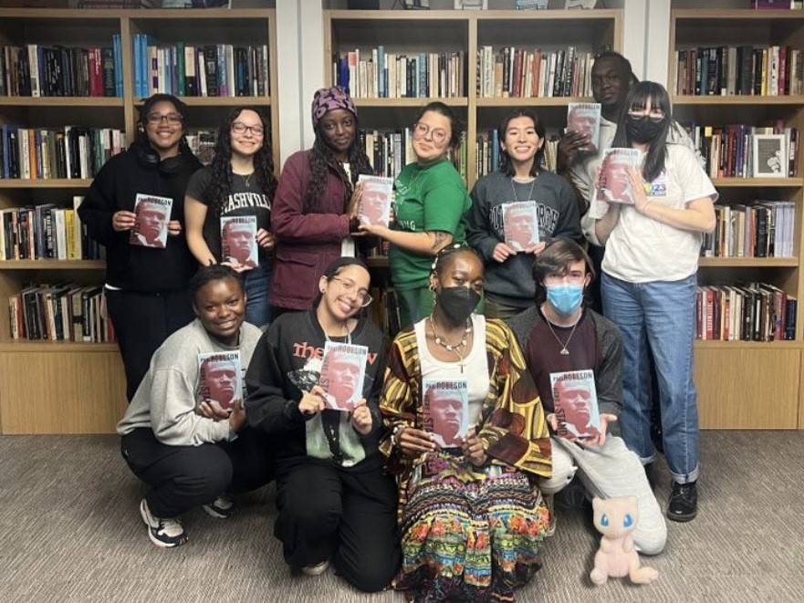 radical readings book club group photo with mew at the bottom right